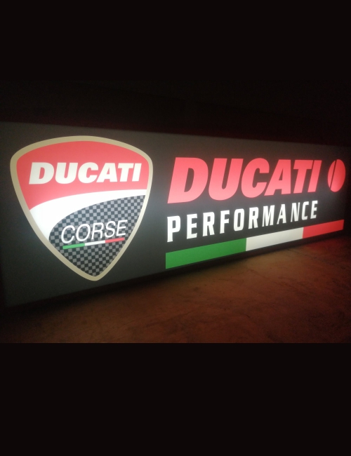 Enseigne publicitaire lumineuse Ducati "performance" Corse